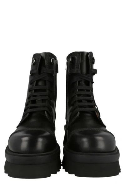 Ferragamo Faraway Lug Sole Combat Boot In Black