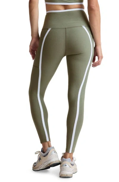 Beyond Yoga Out Of Pocket Side Stripe High Waist Pocket Leggings In Green