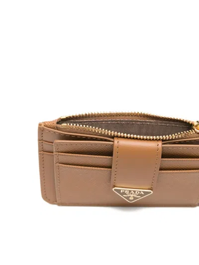 Prada Logo Zip Wallet In Brown