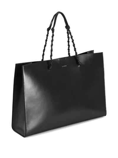 Jil Sander Tangle Knotted Handle Embossed Logo Tote In Black