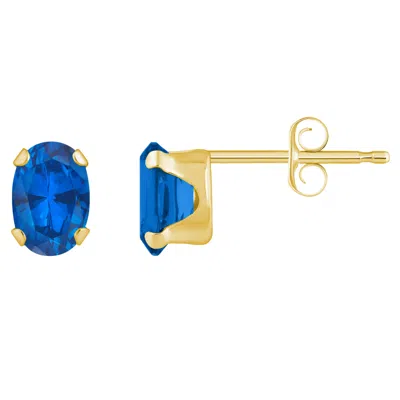 Glistening Jewels 10k Gold 6x4mm Oval Created Sapphire Stud Earrings In Blue