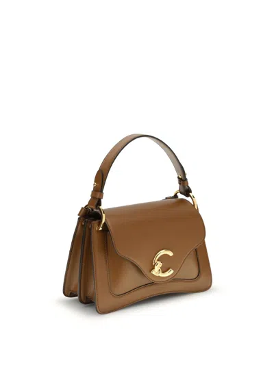 Coccinelle Brown Calf Leather Bos Taurus Handbag In Brown