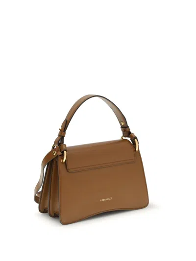 Coccinelle Brown Calf Leather Bos Taurus Handbag In Brown
