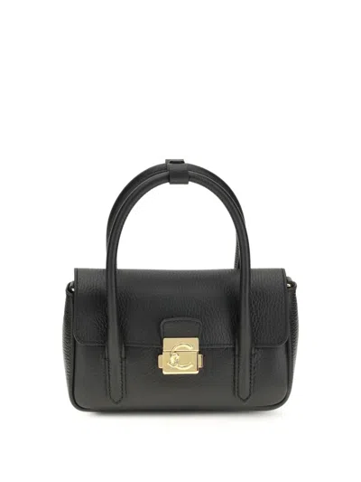 Coccinelle Mini Top-handle Tote Bag In Black