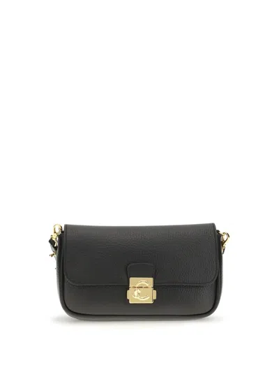Coccinelle C-me Lock Mini Clutch Bag In Black
