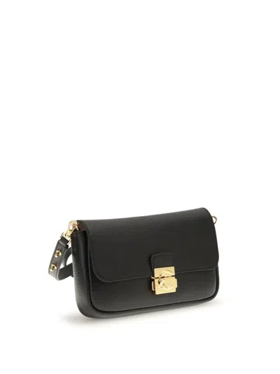 Coccinelle C-me Lock Mini Clutch Bag In Black