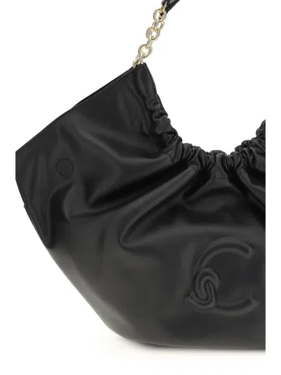 Coccinelle Black Calf Leather Bos Taurus Shoulder Bag In Black