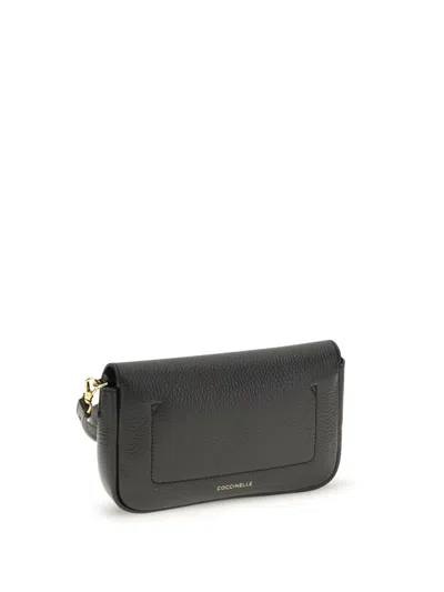 Coccinelle C-me Lock Mini Clutch Bag In Black