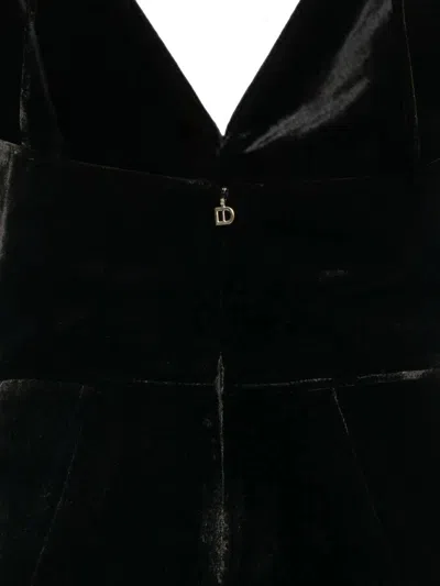 Raquel Diniz Dresses In Black