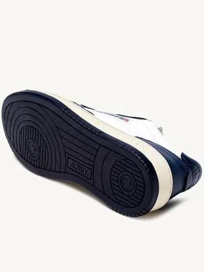 Autry Leather Low-top Sneakers With Contrasting Panels In Blue
