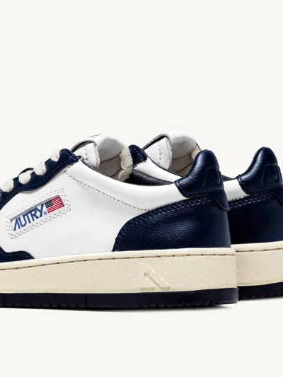 Autry Leather Low-top Sneakers With Contrasting Panels In Blue