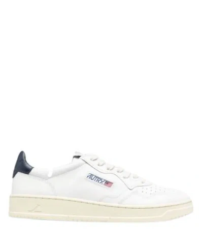 Autry Minimalist Low-top Sneakers With Perforated Detailing In White