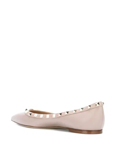Valentino Garavani Valentino Pointed Toe Flat Shoes With Gold-tone Rockstuds In Pink