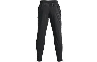 Under Armour Outrun The Storm Pants 'black' In Animal Print