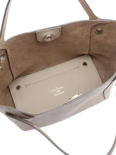 Pre-owned Louis Vuitton 2021 Pm Mahina Hina Laser-cut Leather Handbag In Neutral