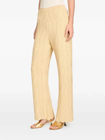 Sandro Geometric-pattern Textured Trousers In Neutral