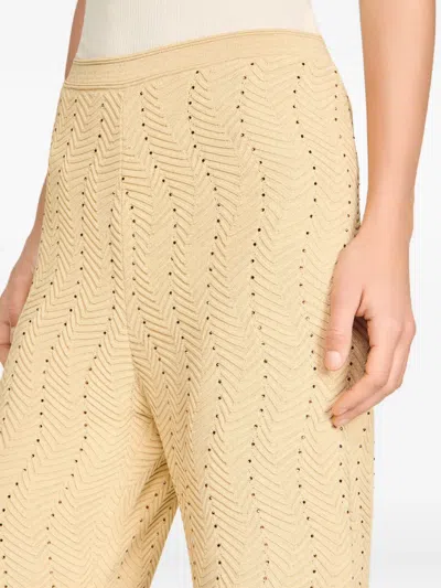 Sandro Geometric-pattern Textured Trousers In Neutral