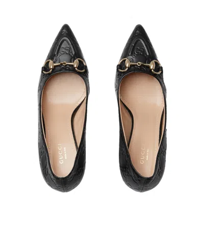 Gucci Calf Leather Bos Taurus Mid Heel Pumps In Animal Print