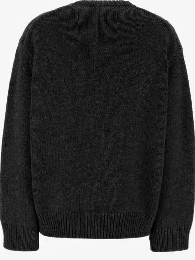 The Row V-neck Long-sleeved Cardigan In Black