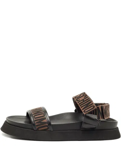 Pre-owned Moschino Logo-embellishment Sandals In Black