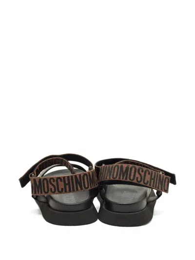 Pre-owned Moschino Logo-embellishment Sandals In Black