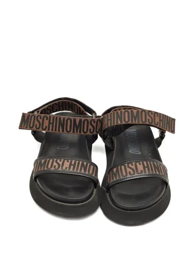 Pre-owned Moschino Logo-embellishment Sandals In Black