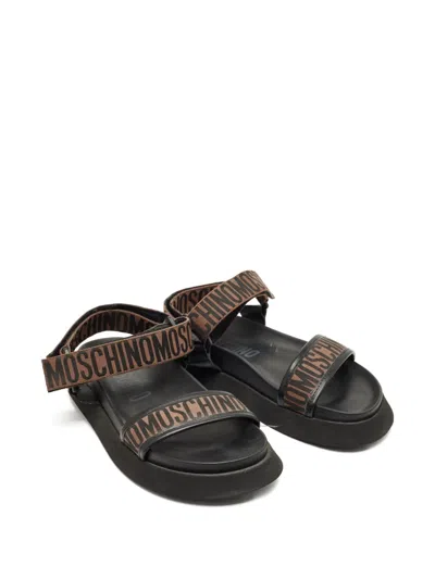 Pre-owned Moschino Logo-embellishment Sandals In Black