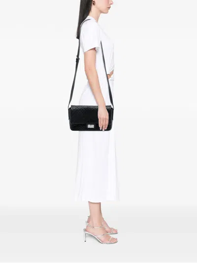 Pre-owned Chanel 2009-2010 Quilted Calfskin Reissue 2.55 Easy Messenger Flap Crossbody Bag In Black