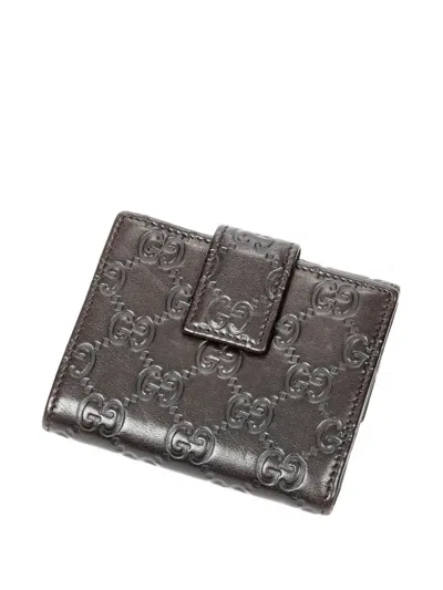 Pre-owned Gucci Embossed Flap Wallet In Brown