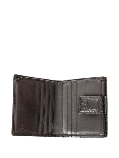 Pre-owned Gucci Embossed Flap Wallet In Brown