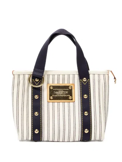 Pre-owned Louis Vuitton 2007 Antigua Cabas Pm Striped Studded Tote Bag In Neutral