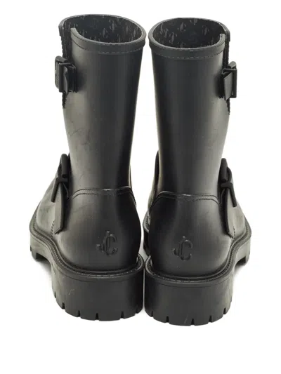 Pre-owned Jimmy Choo Yael Lugged-sole Anbkle Boots In Black