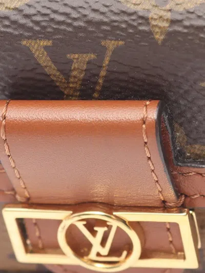 Pre-owned Louis Vuitton 2020 Monogram Reverse Micro Dauphine Crossbody Bag In Brown