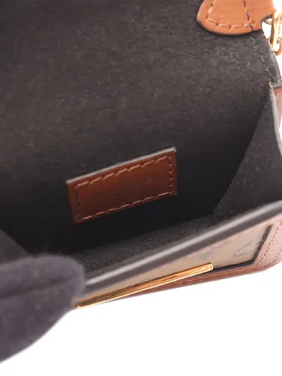 Pre-owned Louis Vuitton 2020 Monogram Reverse Micro Dauphine Crossbody Bag In Brown