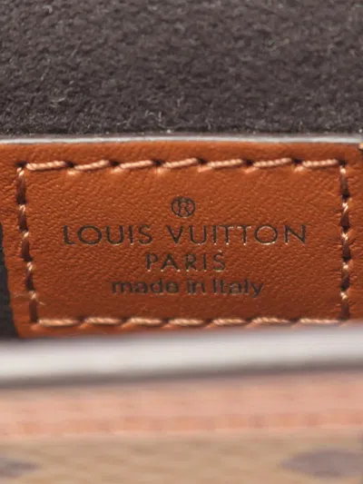 Pre-owned Louis Vuitton 2020 Monogram Reverse Micro Dauphine Crossbody Bag In Brown