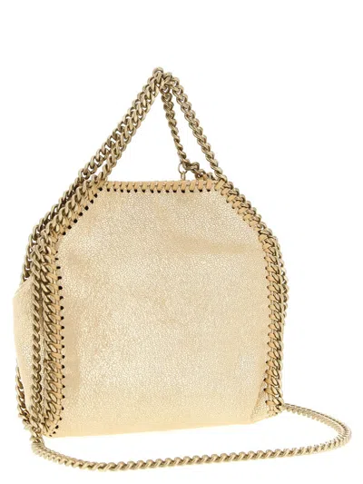 Stella Mccartney Falabella Tiny Crossbody Bags Gold In Nude