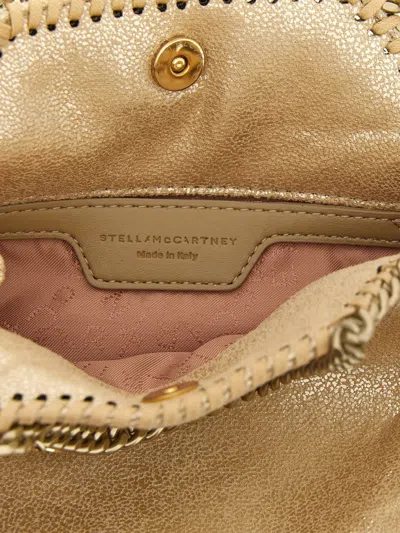 Stella Mccartney Falabella Tiny Crossbody Bags Gold In Nude