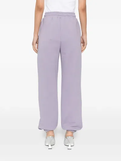Kimhēkim Logo-appliqué Track Pants In Purple
