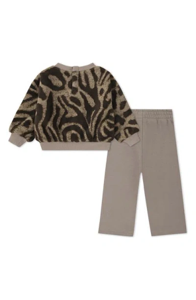 Nike Wild Warmth Sweatshirt & Wide Leg Pants Set In Animal Print