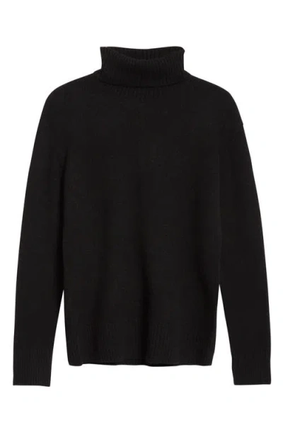 Totême Wool And Silk-blend Turtleneck Sweater In Black