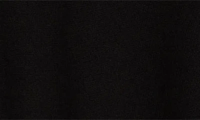 Totême Wool And Silk-blend Turtleneck Sweater In Black