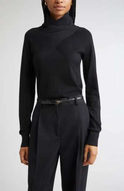 Totême Toteme Merino Wool Crossover Sweater In Black