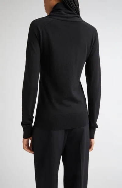 Totême Toteme Merino Wool Crossover Sweater In Black
