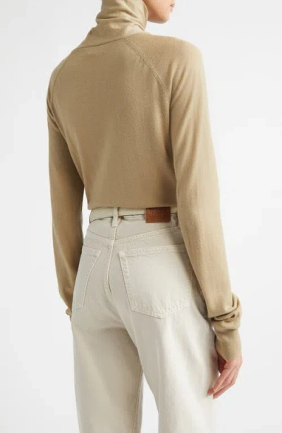 Totême Toteme Merino Wool Crossover Sweater In Neutral