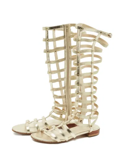 Pre-owned Stuart Weitzman Gladiator Flat Sandal In Gold