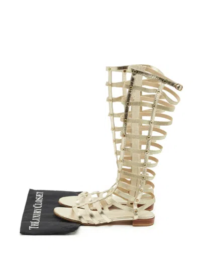Pre-owned Stuart Weitzman Gladiator Flat Sandal In Gold