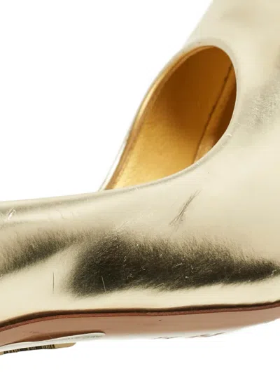 Pre-owned Casadei Vintage Blade Pumps In Gold