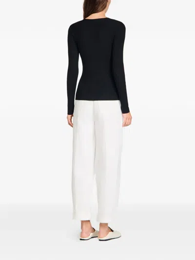 Sandro Ribbed Cardigan With Fancy Buttons In Black