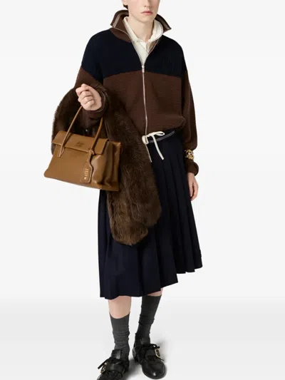Miu Miu Logo-detail Zipped Cardigan In Brown