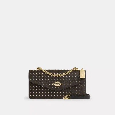 Coach Outlet Klare Envelope Crossbody Bag In Signature Canvas With Rivets In Black